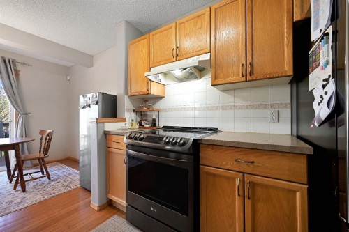 408 Bridlewood Court Sw, Calgary, AB - Indoor Photo Showing Kitchen