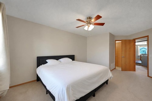 408 Bridlewood Court Sw, Calgary, AB - Indoor Photo Showing Bedroom