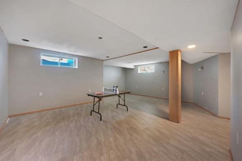 408 Bridlewood Court Sw, Calgary, AB - Indoor Photo Showing Basement