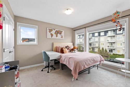 79 Cornerstone Passage Ne, Calgary, AB - Indoor Photo Showing Bedroom