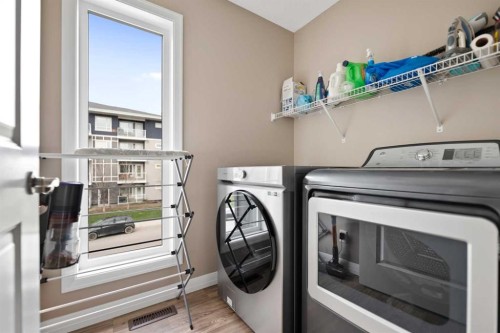 79 Cornerstone Passage Ne, Calgary, AB - Indoor Photo Showing Laundry Room