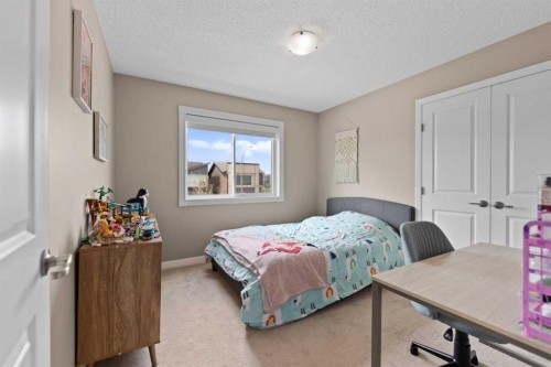 79 Cornerstone Passage Ne, Calgary, AB - Indoor Photo Showing Bedroom