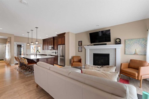 79 Cornerstone Passage Ne, Calgary, AB - Indoor Photo Showing Living Room With Fireplace