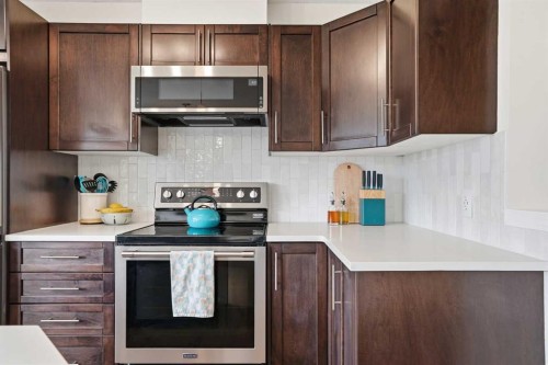 24 Auburn Crest Park Se, Calgary, AB - Indoor Photo Showing Kitchen With Stainless Steel Kitchen