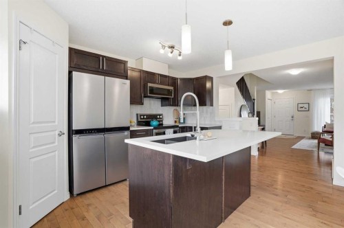 24 Auburn Crest Park Se, Calgary, AB - Indoor Photo Showing Kitchen With Stainless Steel Kitchen With Double Sink With Upgraded Kitchen