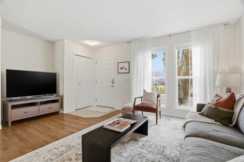 24 Auburn Crest Park Se, Calgary, AB - Indoor Photo Showing Living Room