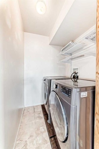 17 Ross Place, Crossfield, AB - Indoor Photo Showing Laundry Room