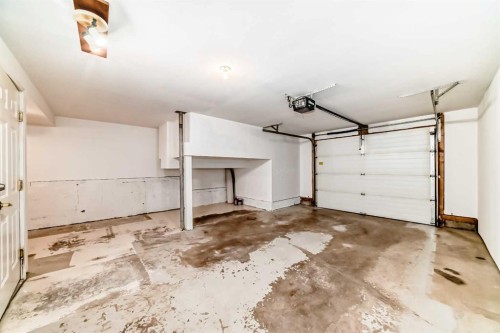 17 Ross Place, Crossfield, AB - Indoor Photo Showing Garage