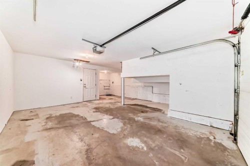 17 Ross Place, Crossfield, AB - Indoor Photo Showing Garage