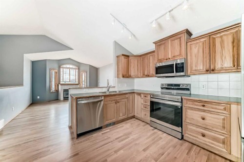 17 Ross Place, Crossfield, AB - Indoor Photo Showing Kitchen With Double Sink