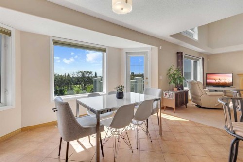 9 Panorama Hills Manor Nw, Calgary, AB - Indoor Photo Showing Dining Room