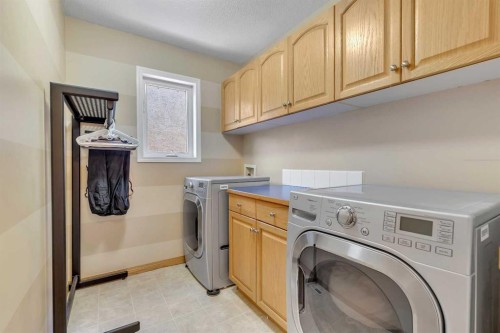 9 Panorama Hills Manor Nw, Calgary, AB - Indoor Photo Showing Laundry Room