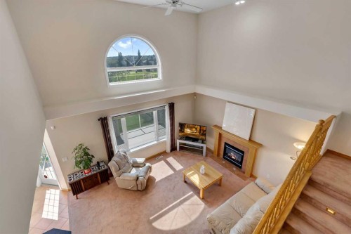 9 Panorama Hills Manor Nw, Calgary, AB - Indoor With Fireplace
