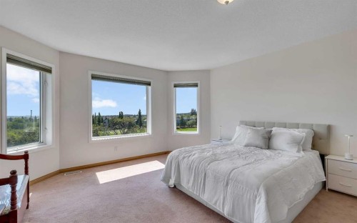 9 Panorama Hills Manor Nw, Calgary, AB - Indoor Photo Showing Bedroom