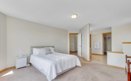 9 Panorama Hills Manor Nw, Calgary, AB - Indoor Photo Showing Bedroom