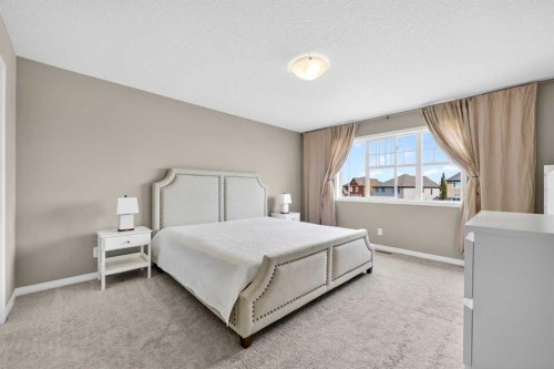 293 Windrow Crescent Sw, Airdrie, AB - Indoor Photo Showing Bedroom