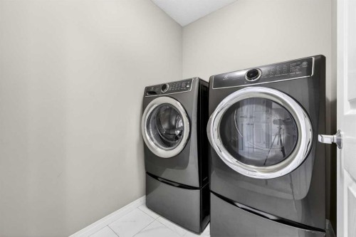 293 Windrow Crescent Sw, Airdrie, AB - Indoor Photo Showing Laundry Room