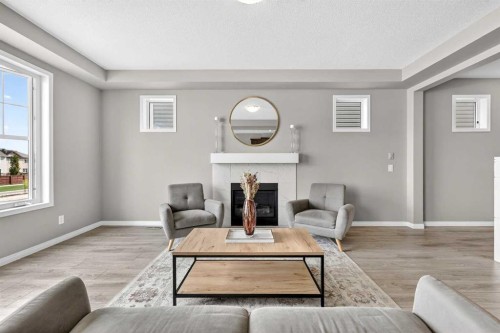 293 Windrow Crescent Sw, Airdrie, AB - Indoor Photo Showing Other Room With Fireplace