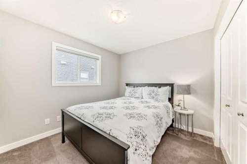 2201 Bayside Circle Sw, Airdrie, AB - Indoor Photo Showing Bedroom