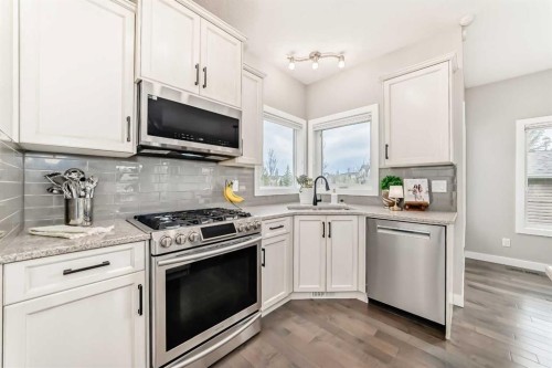 2201 Bayside Circle Sw, Airdrie, AB - Indoor Photo Showing Kitchen With Stainless Steel Kitchen With Upgraded Kitchen