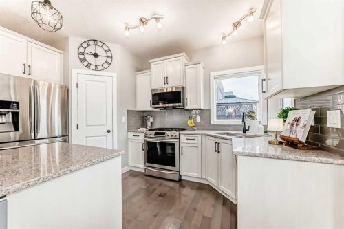 2201 Bayside Circle Sw, Airdrie, AB - Indoor Photo Showing Kitchen With Stainless Steel Kitchen With Upgraded Kitchen