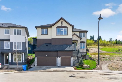 148 Crestridge Terrace Sw, Calgary, AB - Outdoor With Facade