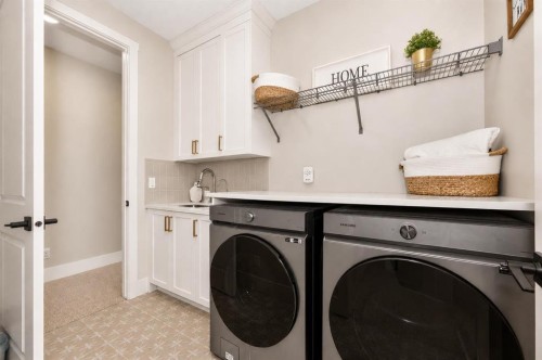 148 Crestridge Terrace Sw, Calgary, AB - Indoor Photo Showing Laundry Room