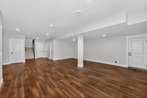 148 Crestridge Terrace Sw, Calgary, AB - Indoor Photo Showing Other Room