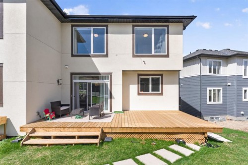 148 Crestridge Terrace Sw, Calgary, AB - Outdoor With Deck Patio Veranda With Exterior
