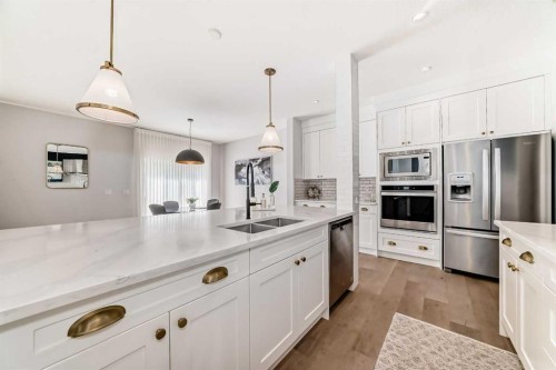 420 Legacy View Se, Calgary, AB - Indoor Photo Showing Kitchen With Stainless Steel Kitchen With Double Sink With Upgraded Kitchen