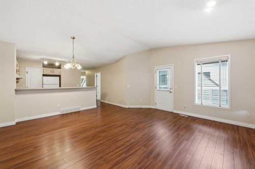 25 Tararidge Circle Ne, Calgary, AB - Indoor Photo Showing Other Room