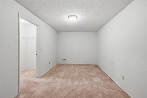 25 Tararidge Circle Ne, Calgary, AB - Indoor Photo Showing Other Room