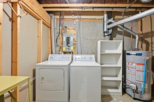 25 Tararidge Circle Ne, Calgary, AB - Indoor Photo Showing Laundry Room