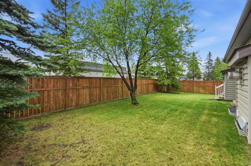 25 Tararidge Circle Ne, Calgary, AB - Outdoor With Backyard