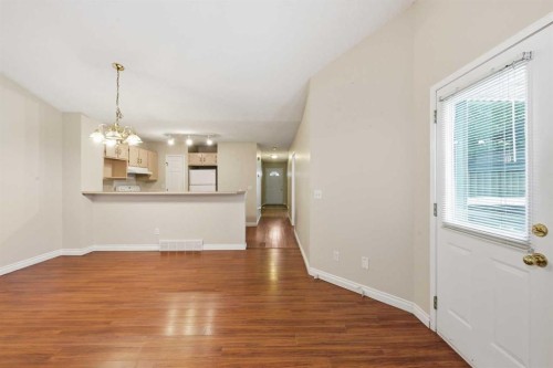 25 Tararidge Circle Ne, Calgary, AB - Indoor Photo Showing Other Room
