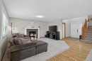 112 West Creek Close, Chestermere, AB  - Indoor Photo Showing Living Room With Fireplace 