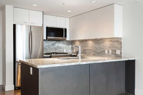 1006-519 Riverfront Avenue Se, Calgary, AB - Indoor Photo Showing Kitchen With Upgraded Kitchen