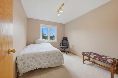 52 Edgebrook Rise Nw, Calgary, AB - Indoor Photo Showing Bedroom