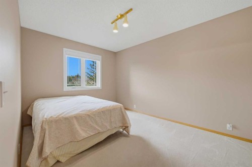 52 Edgebrook Rise Nw, Calgary, AB - Indoor Photo Showing Bedroom