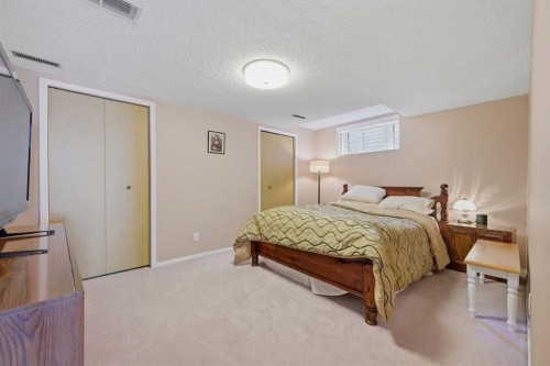 52 Edgebrook Rise Nw, Calgary, AB - Indoor Photo Showing Bedroom