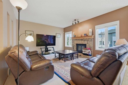 52 Edgebrook Rise Nw, Calgary, AB - Indoor Photo Showing Living Room With Fireplace