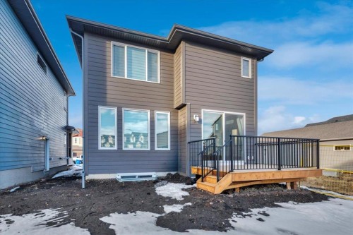 77 Versant Point Sw, Calgary, AB - Outdoor With Deck Patio Veranda With Exterior