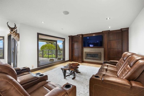 136 Edelweiss Drive Nw, Calgary, AB - Indoor Photo Showing Living Room With Fireplace