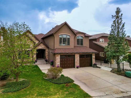 136 Edelweiss Drive Nw, Calgary, AB - Outdoor With Facade