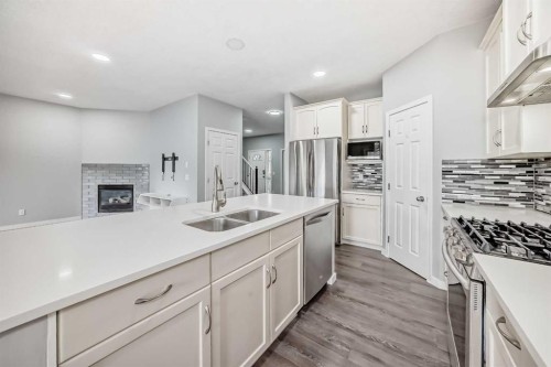 114 Valley Crest Close Nw, Calgary, AB - Indoor Photo Showing Kitchen With Double Sink