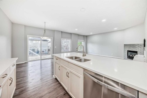 114 Valley Crest Close Nw, Calgary, AB - Indoor Photo Showing Kitchen With Double Sink