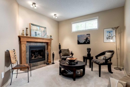 38 Kincora Terrace Nw, Calgary, AB - Indoor Photo Showing Living Room With Fireplace
