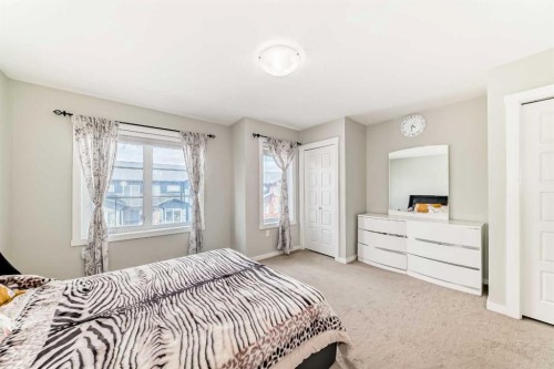 228 Red Embers Way Ne, Calgary, AB - Indoor Photo Showing Bedroom