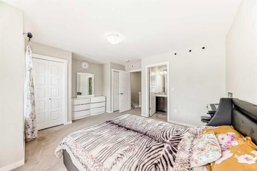 228 Red Embers Way Ne, Calgary, AB - Indoor Photo Showing Bedroom