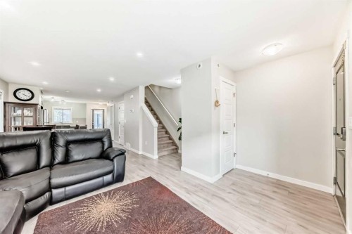 228 Red Embers Way Ne, Calgary, AB - Indoor Photo Showing Living Room